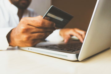 Man paying online with credit card